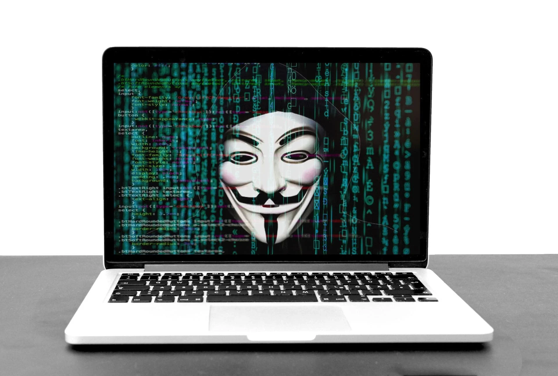 Laptop showing image of classic hacker mask